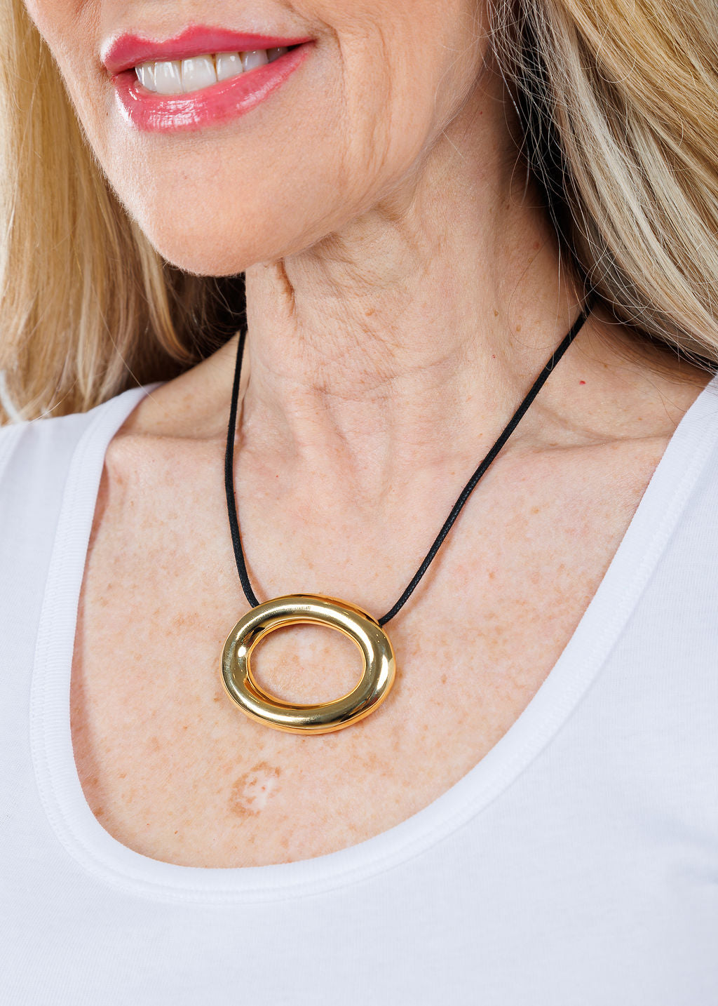 Ben Amun Adobe Cord Necklace with Gold Oval Pendant available at Barbara Katz