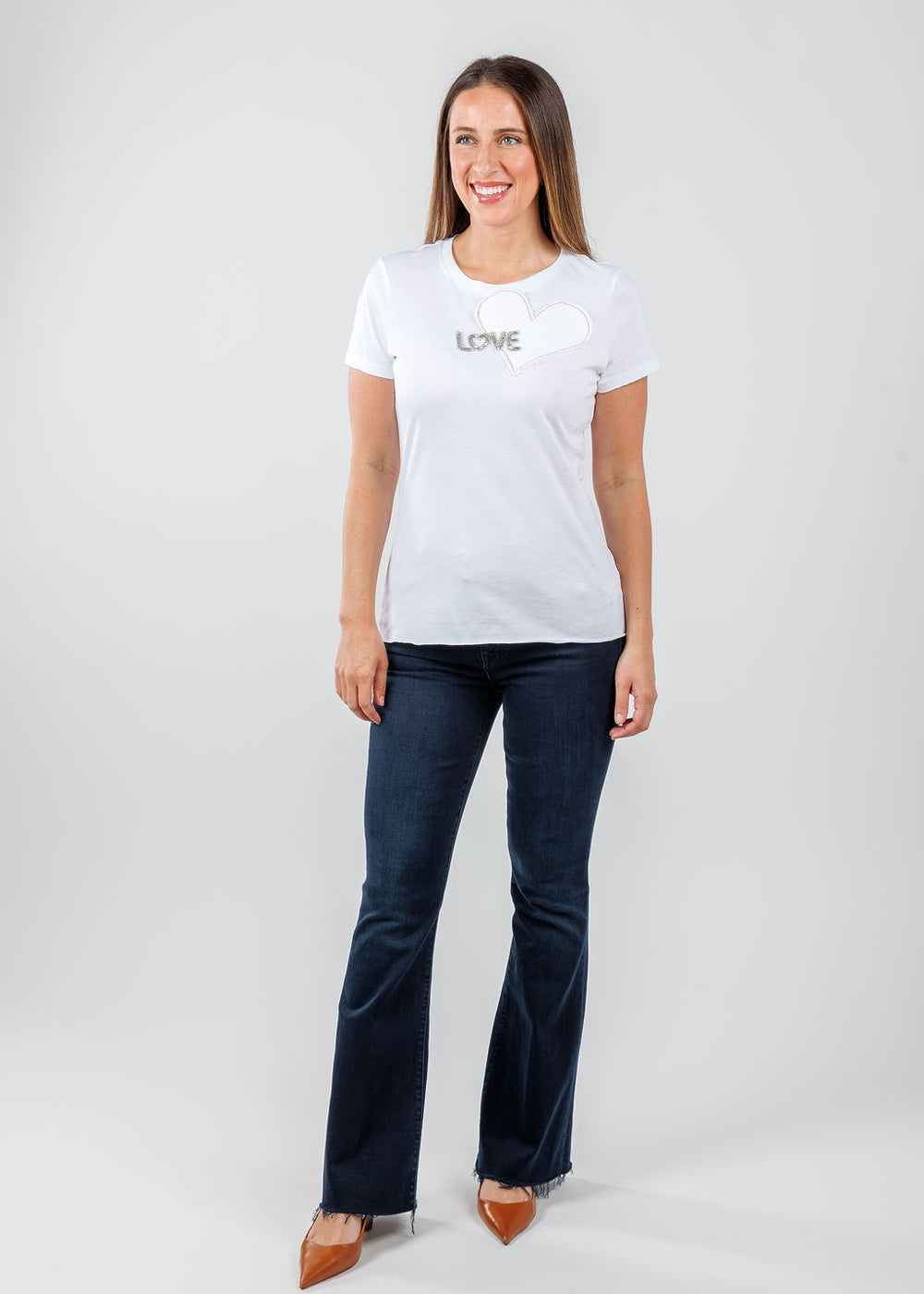 Suzy T Love + Heart Top in White	
paired with Mother The Weekender Fray Jeans in Chip On My Shoulder available at Barbara Katz