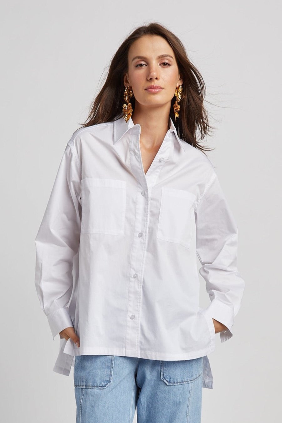 Adroit Atelier Nubia Button Down Stretch Shirt With High Low Hem in White available at Barbara Katz