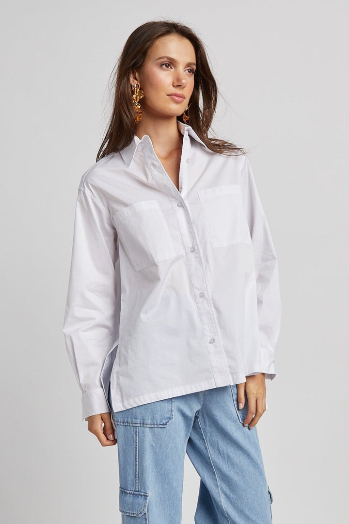Adroit Atelier Nubia Button Down Stretch Shirt With High Low Hem in White available at Barbara Katz