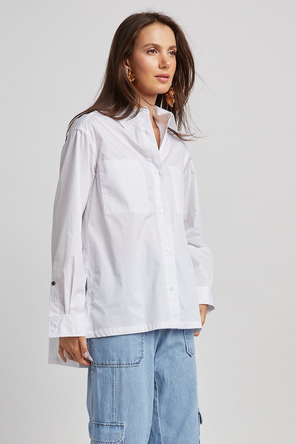 Adroit Atelier Nubia Button Down Stretch Shirt With High Low Hem in White available at Barbara Katz