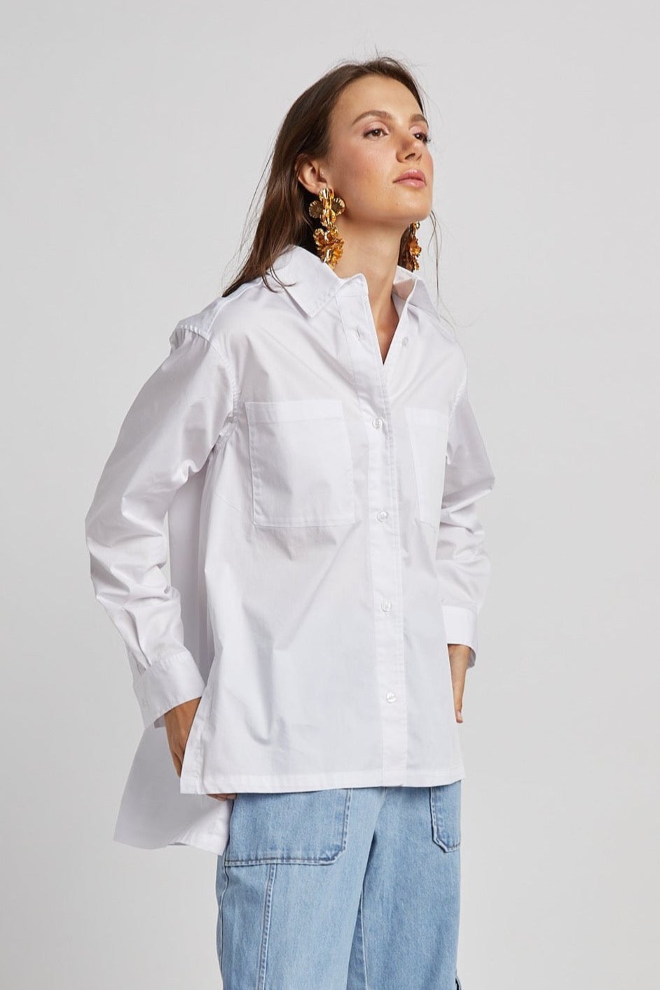 Adroit Atelier Nubia Button Down Stretch Shirt With High Low Hem in White available at Barbara Katz