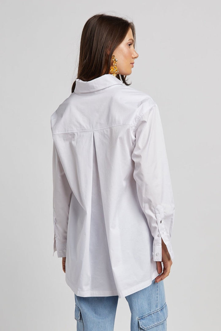 Adroit Atelier Nubia Button Down Stretch Shirt With High Low Hem in White available at Barbara Katz