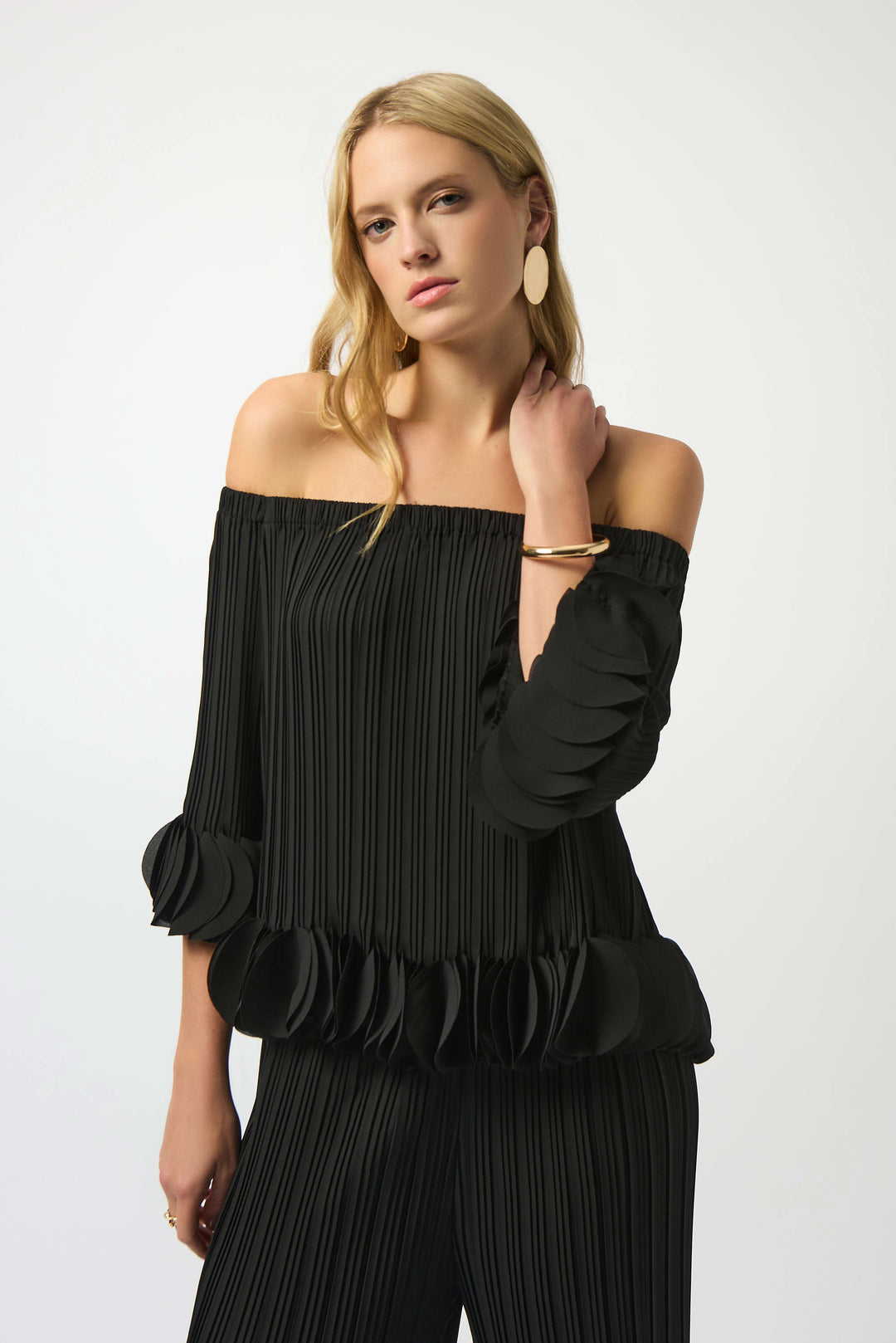 Joseph Ribkoff Joa Ruffle Out Of Shoulder Top in Black available at Barbara Katz