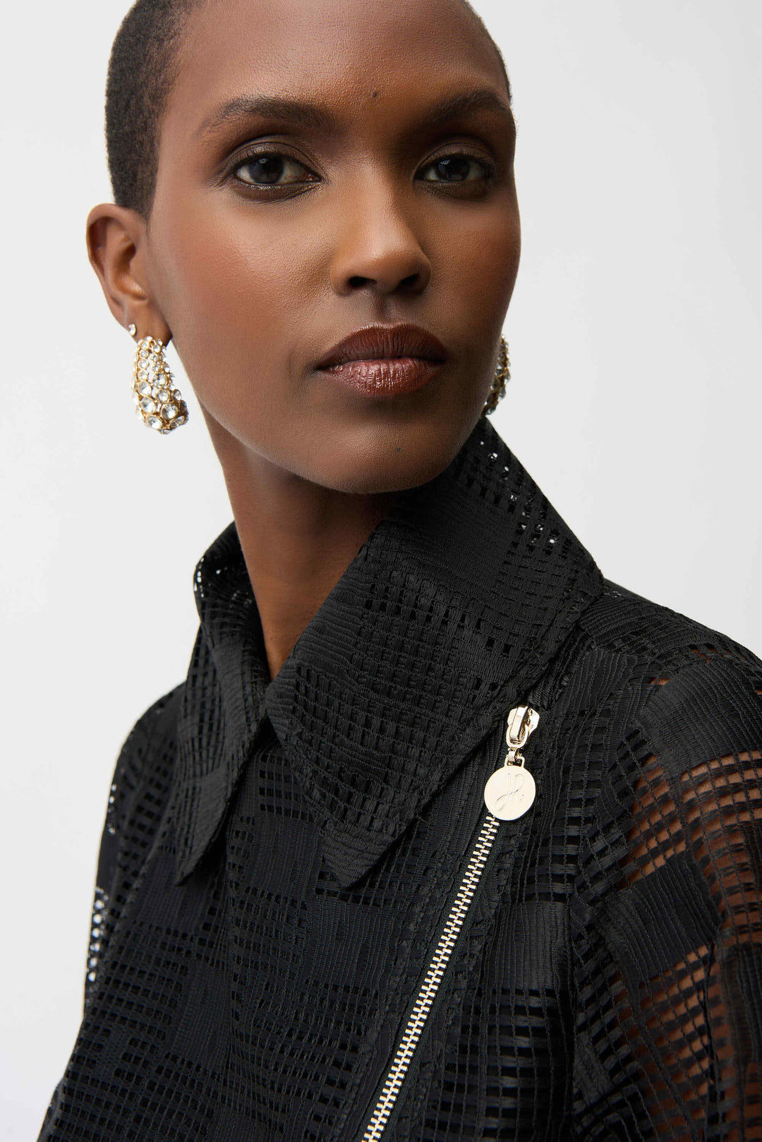 Joseph Ribkoff Geometric Mesh Moto Jacket With Asymmetric Zipper in Black available at Barbara Katz