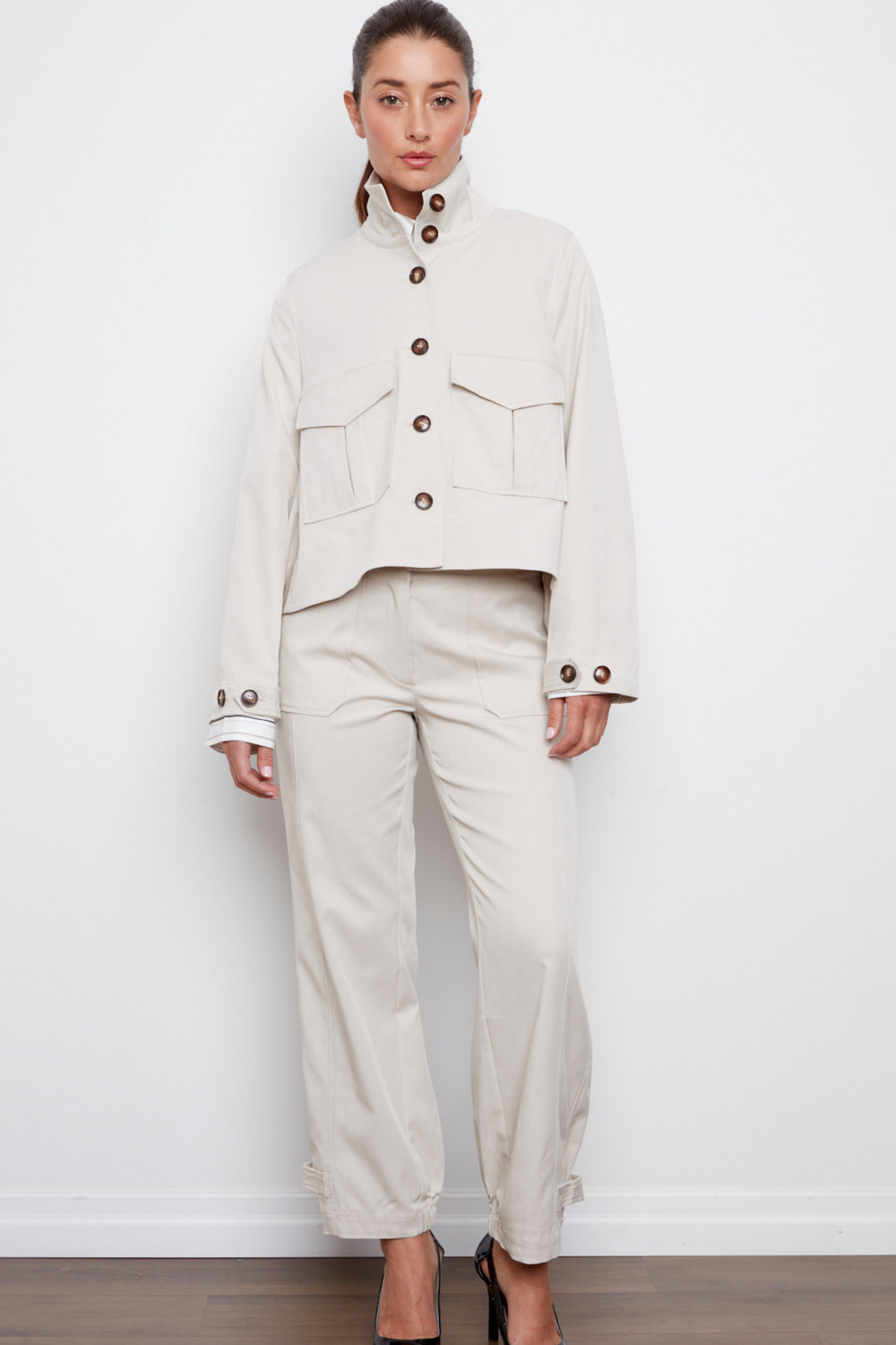 Adroit Atelier Celine Button-Front Jacket With a Slightly High-Low Hem in Elephant available at Barbara Katz