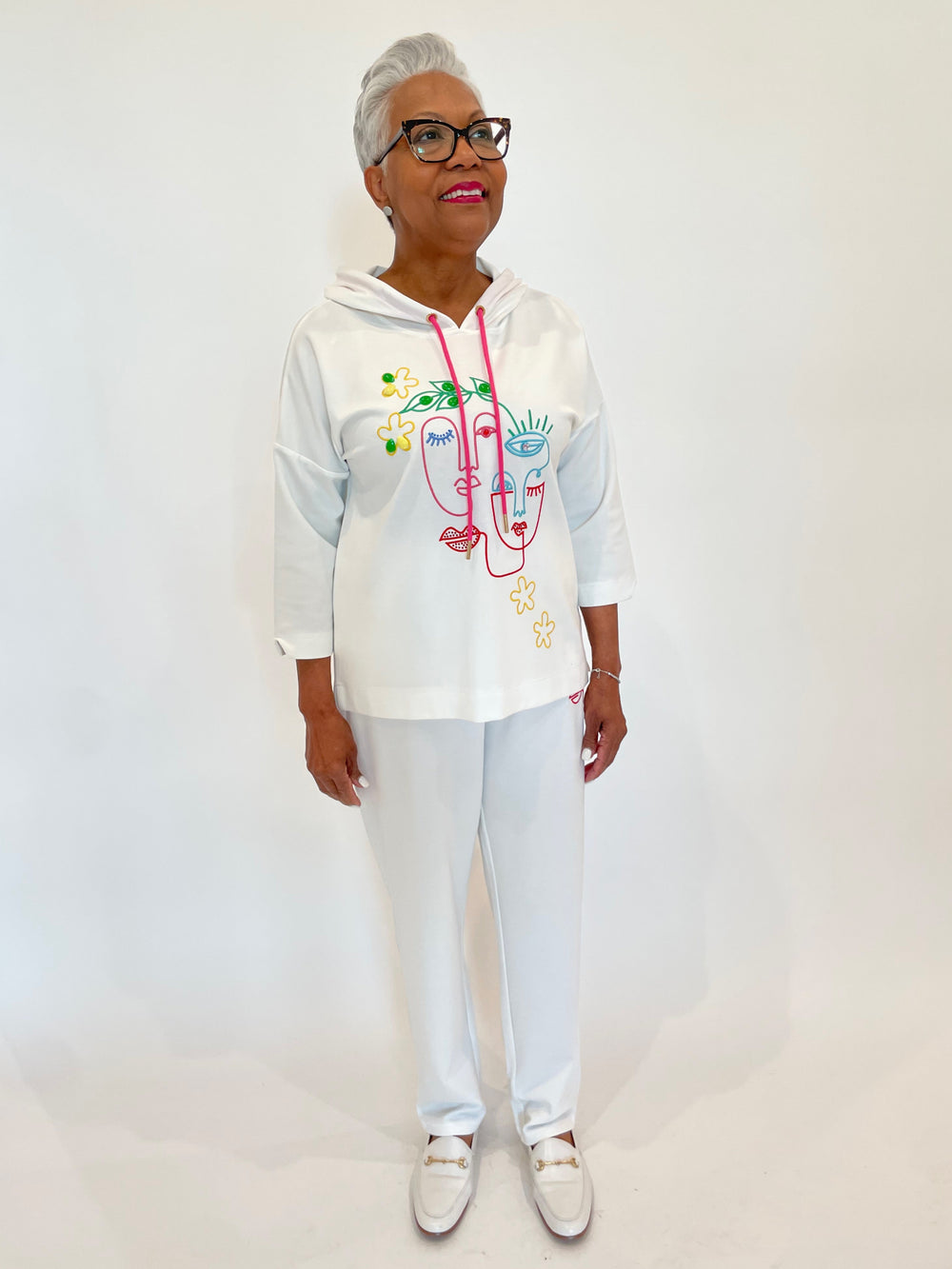 Leo & Ugo Dominic Faces Hoodie in White/Multi paired with matching Dominic Faces Pants available at Barbara Katz