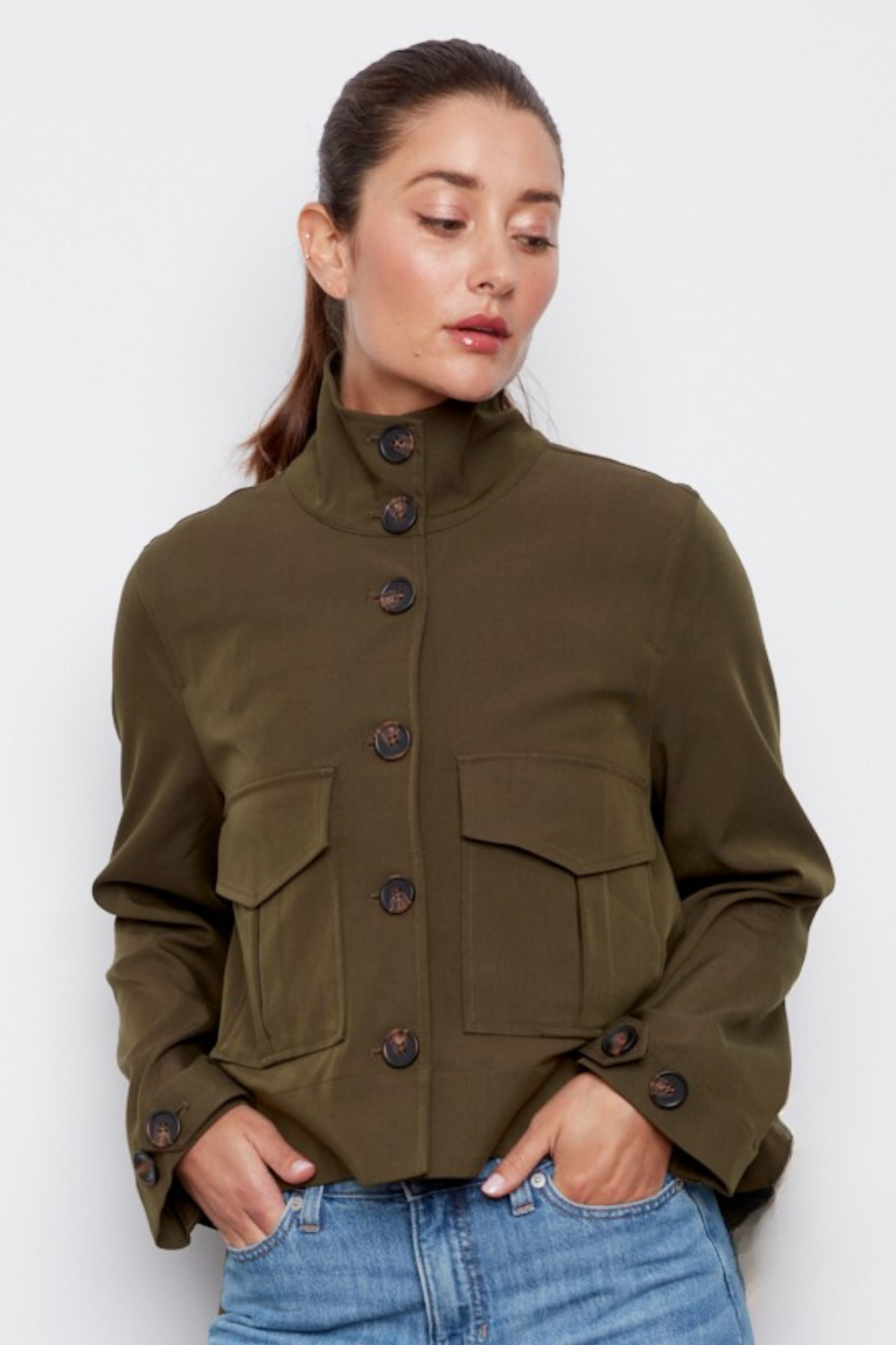 Adroit Atelier Celine Button-Front Jacket With a Slightly High-Low Hem in Dark Olive available at Barbara Katz
