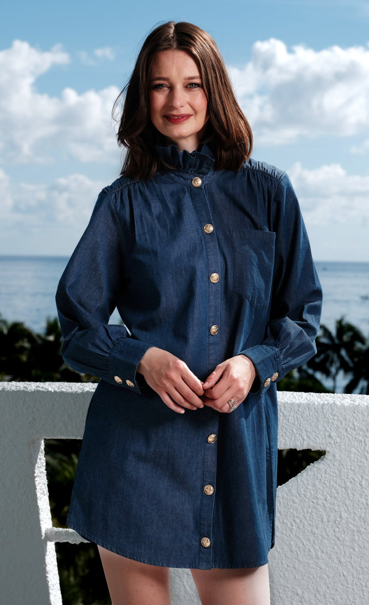 Dizzy-Lizzie Denim Tunic with Ruffle Neck and Side Pockets available at Barbara Katz