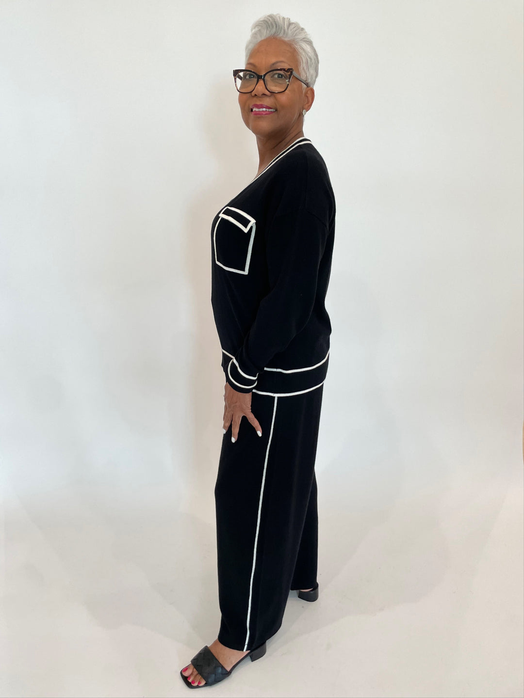 Leo & Ugo Nora V-Neck Sweater in Black/White paired with matching Nora Pants in Black/White available at Barbara Katz