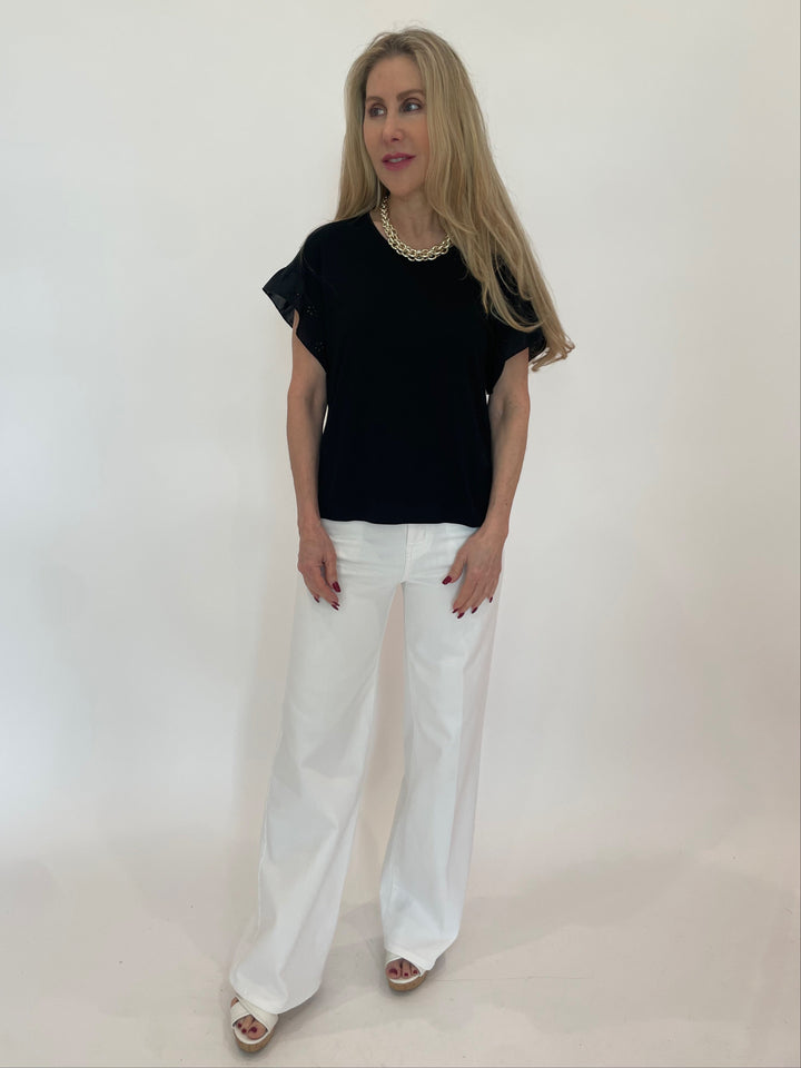 Bariloche Alexandrina Rose Top in Black  paired with Frame Le Slim Palazzo Jeans in White available at Barbara Katz