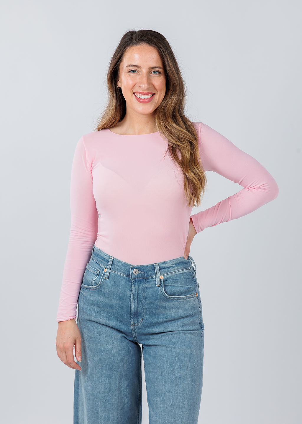 AMB Designs Solid Raw Edge High Neck Second Skin Top in Candy Pink available at Barbara Katz