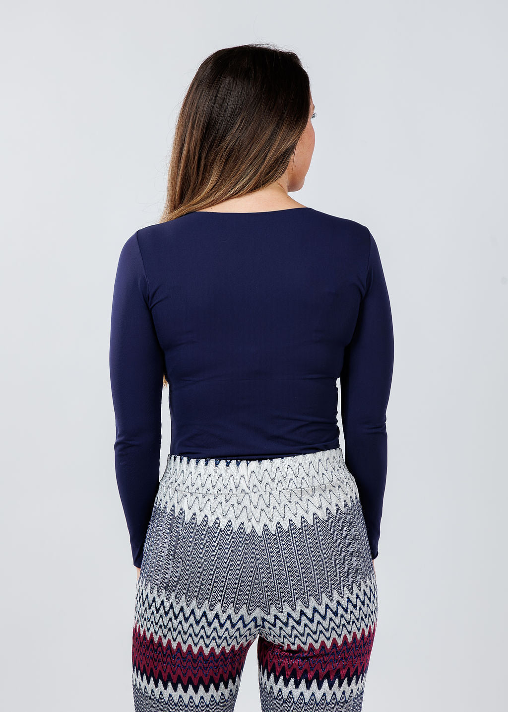 AMB Designs Solid Raw Edge High Neck Second Skin Top in Navy available at Barbara Katz