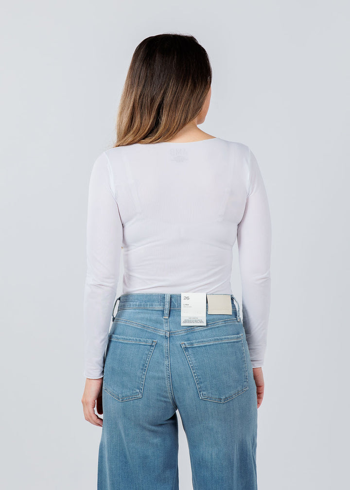 AMB Designs Solid Raw Edge High Neck Second Skin Top in White available at Barbara Katz