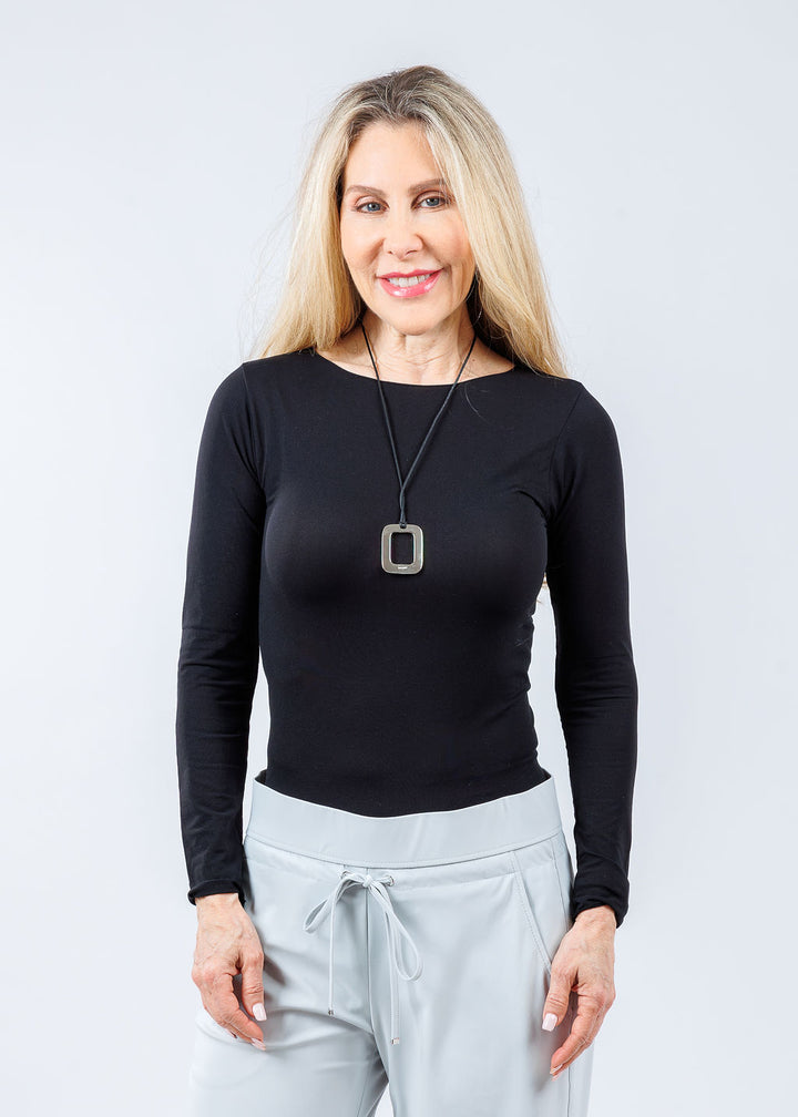 AMB Solid Raw Edge High Neck Second Skin Top in Black available at Barbara Katz