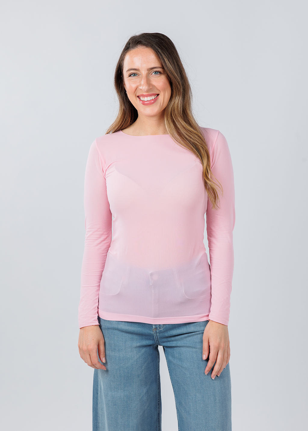 AMB Designs Solid Raw Edge High Neck Second Skin Top in Candy Pink available at Barbara Katz