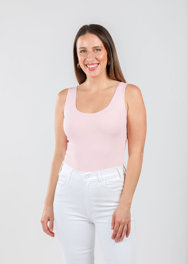 A'NUE The Classic Micro Tank Top in Ballet Slipper featuring a scoop neckline, wide shoulder straps, form-fitting fit, travel-friendly style available at Barbara Katz.
