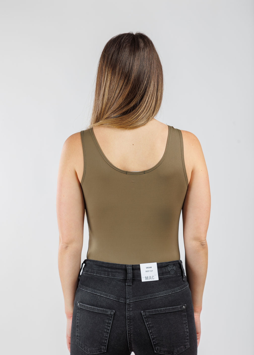 A'NUE The Classic Micro Tank Top in Olive  featuring a scoop neckline, wide shoulder straps, form-fitting fit, travel-friendly style available at Barbara Katz.