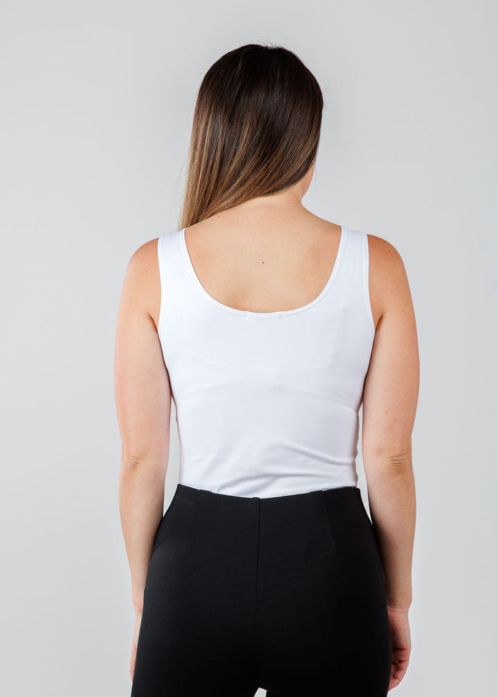 A'NUE The Classic Micro Tank Top in White featuring a scoop neckline, wide shoulder straps, form-fitting fit, travel-friendly style available at Barbara Katz.