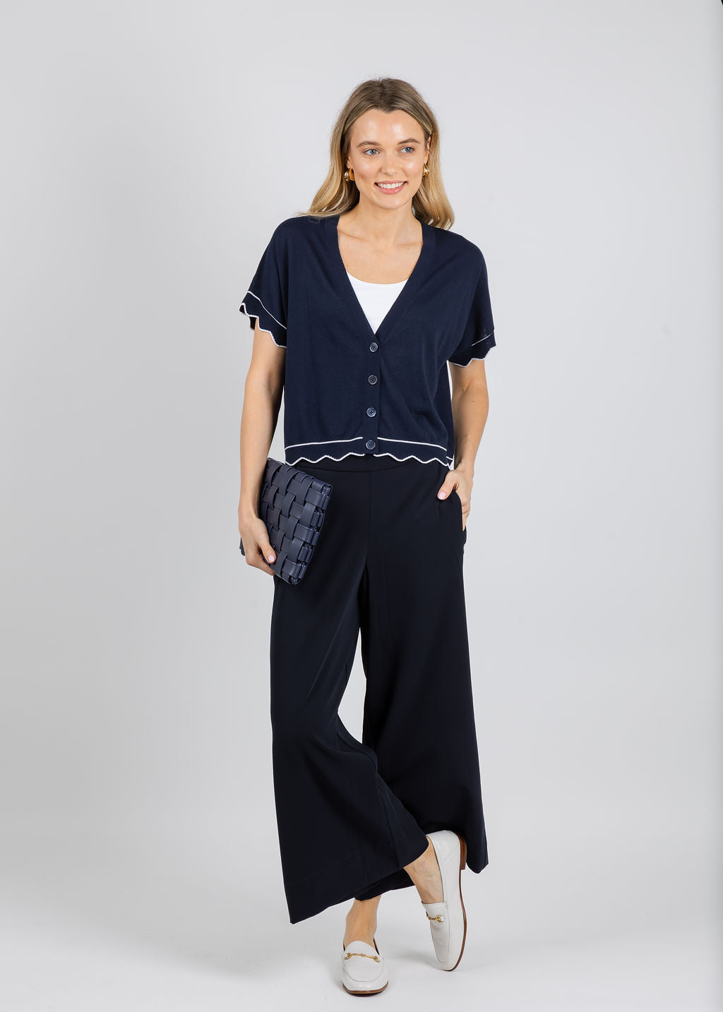 Autumn Cashmere Cardigan With Scallop Edges in Navy/White paired with MAC Coralie Crop Floating Crepe Pants in Navy available at Barbara Katz