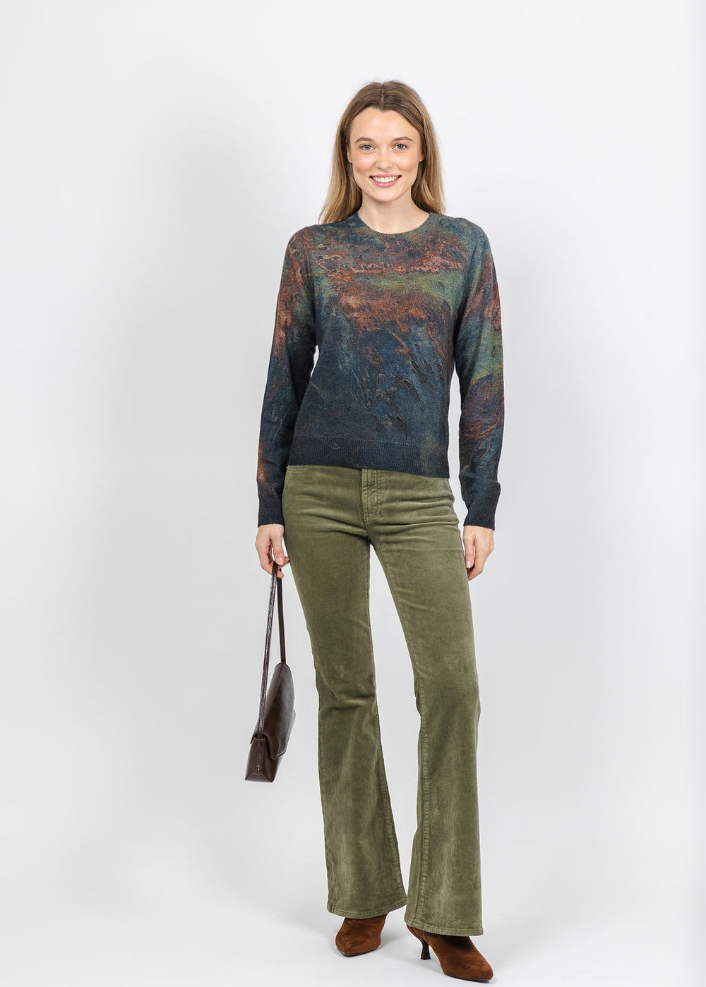 Autumn Cashmere Oil Print Crew Sweater in Copper Combo paired with Pistola Kinsley Mid Rise Ultra Flare Jeans in Sequoia available at Barbara Katz