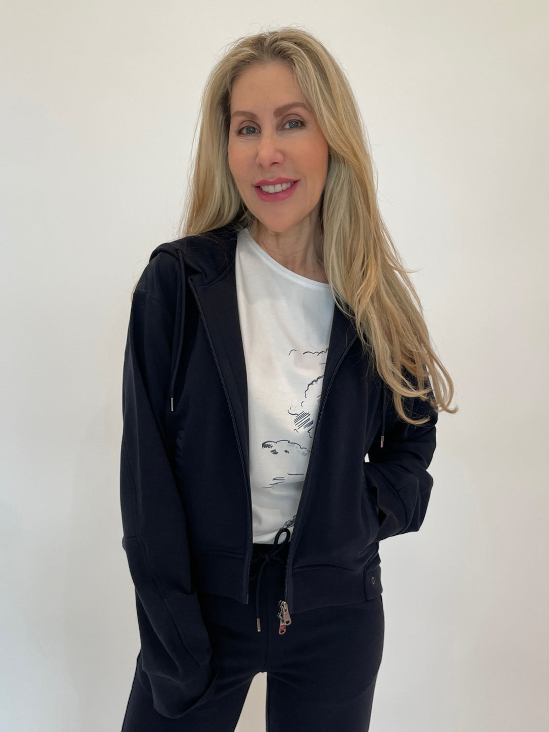 Margittes Drawstring Hoodie in Marine with Margittes White Graffic Tee underneath available at Barbara Katz