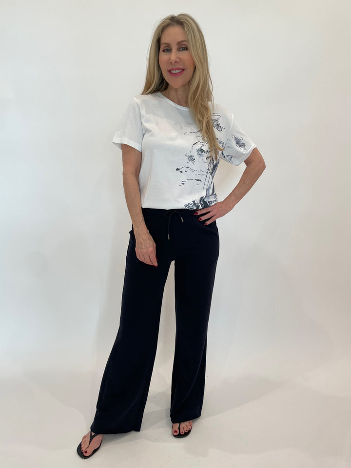 Margittes Graffic Tee in White paired with Margittes Drawstring Sweatpants in Marine available at Barbara Katz
