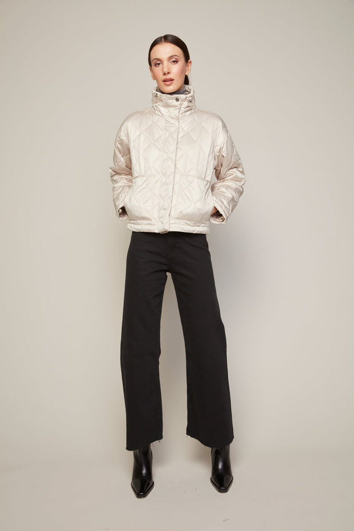 Adroit Atelier Billie Drop Shoulder Quilted Jacket With Twill Tape Detail in Birch available at Barbara Katz