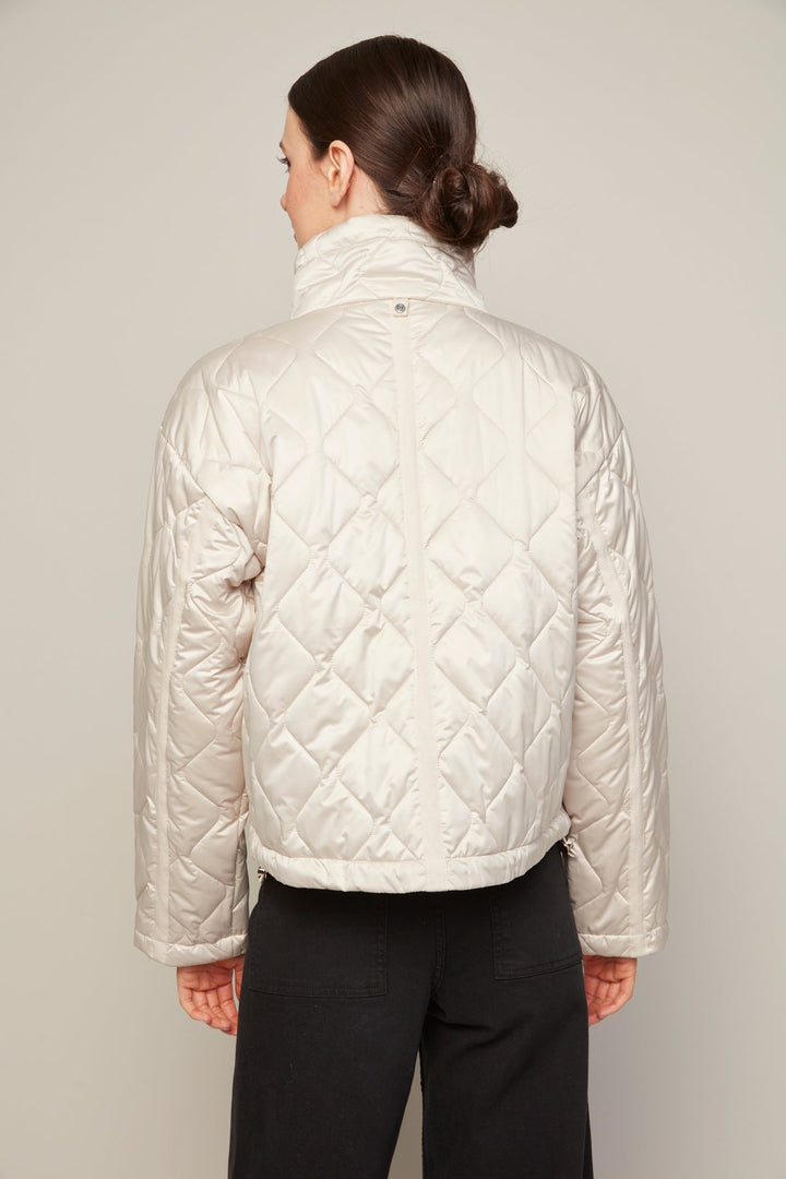 Adroit Atelier Billie Drop Shoulder Quilted Jacket With Twill Tape Detail in Birch available at Barbara Katz