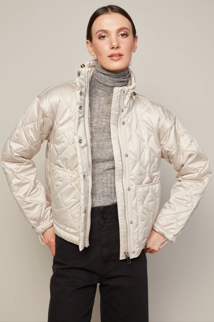Adroit Atelier Billie Drop Shoulder Quilted Jacket With Twill Tape Detail in Birch available at Barbara Katz
