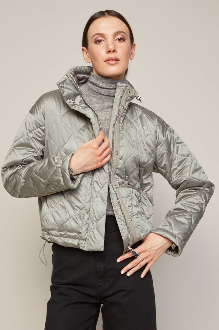 Adroit Atelier Billie Drop Shoulder Quilted Jacket With Twill Tape Detail in Agave Green available at Barbara Katz