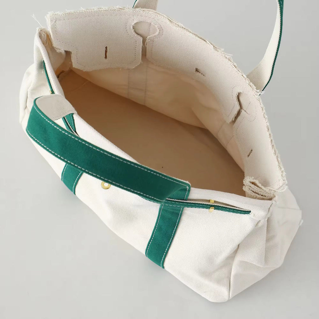 BK Handbags The Weekender Distressed Tote Bag in Green available at Barbara Katz