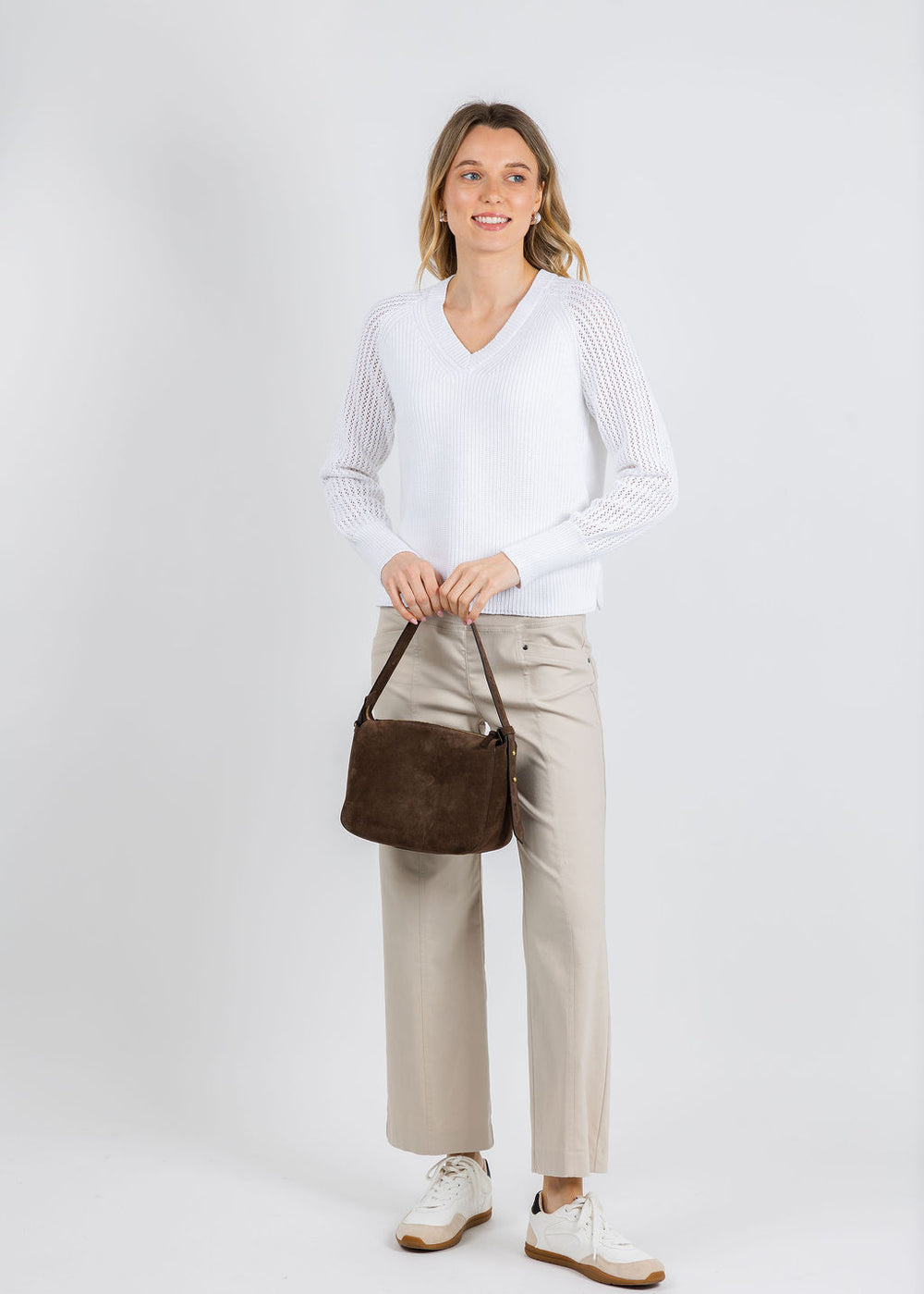 BK Ollie Open Weave Sleeve V Neck Shaker Sweater in White paired with Elliott Lauren 27" Control Stretch Grommet Wide Leg Pants in Chino available at Barbara Katz
