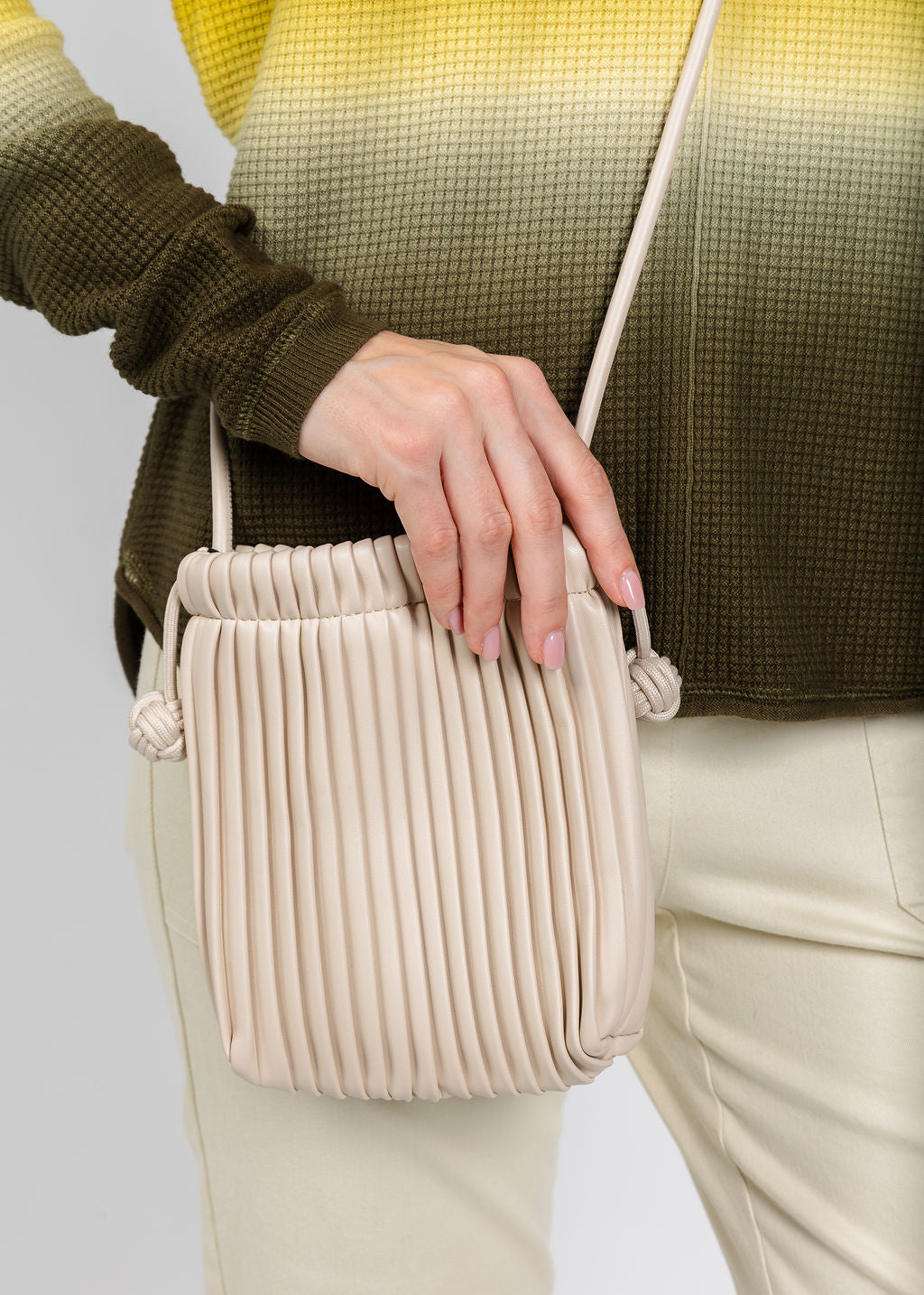 BK Pleated Drawstring Cellphone Bag in Beige available at Barbara Katz
