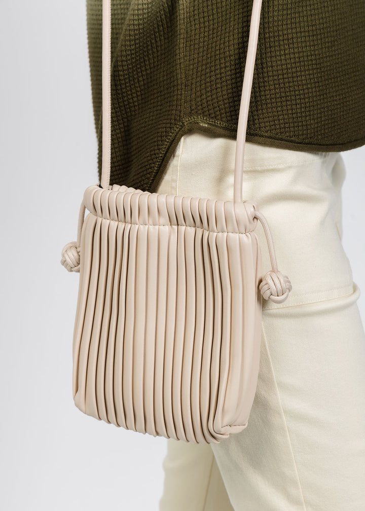 BK Pleated Drawstring Cellphone Bag in Beige available at Barbara Katz