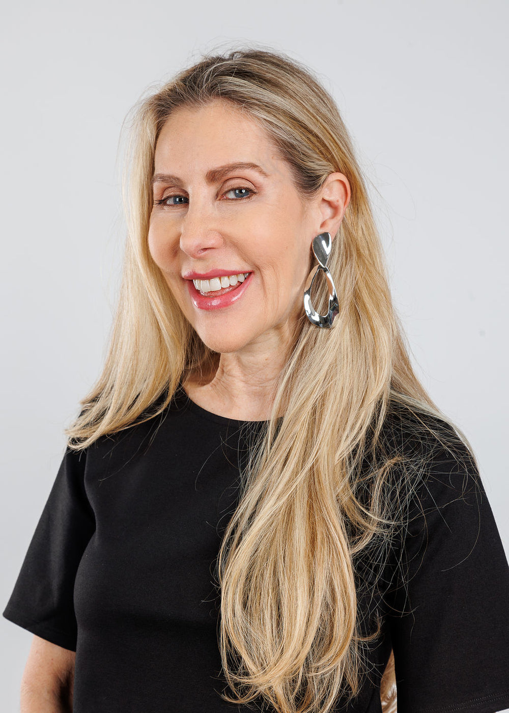 BK Shiny Silver Hammered Open Teardrop Earrings available at Barbara Katz