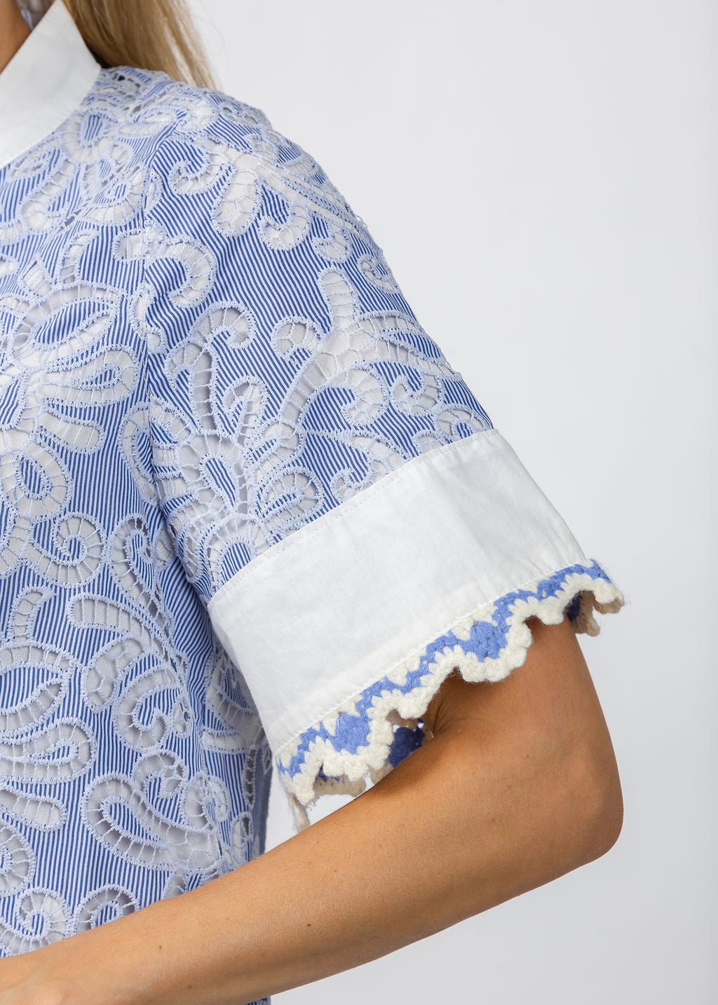BK Short Sleeve Lace Detailing V-Neck Top in Blue available at Barbara Katz