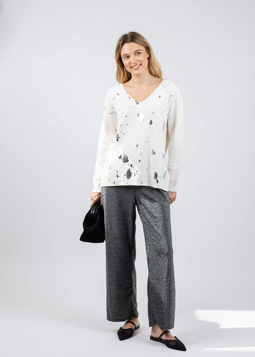 BK Vicky V-Neck Foil Splatter Sweater in White Silver paired with BK Lucy Lurex Pull-On Straight Leg Pants in Black available at Barbara Katz