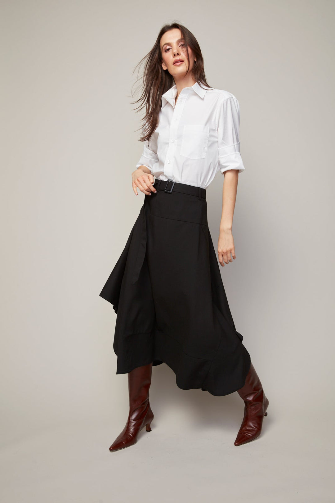 Adroit Atelier Benika Long Asymmetric Flair Skirt in Black available at Barbara Katz
