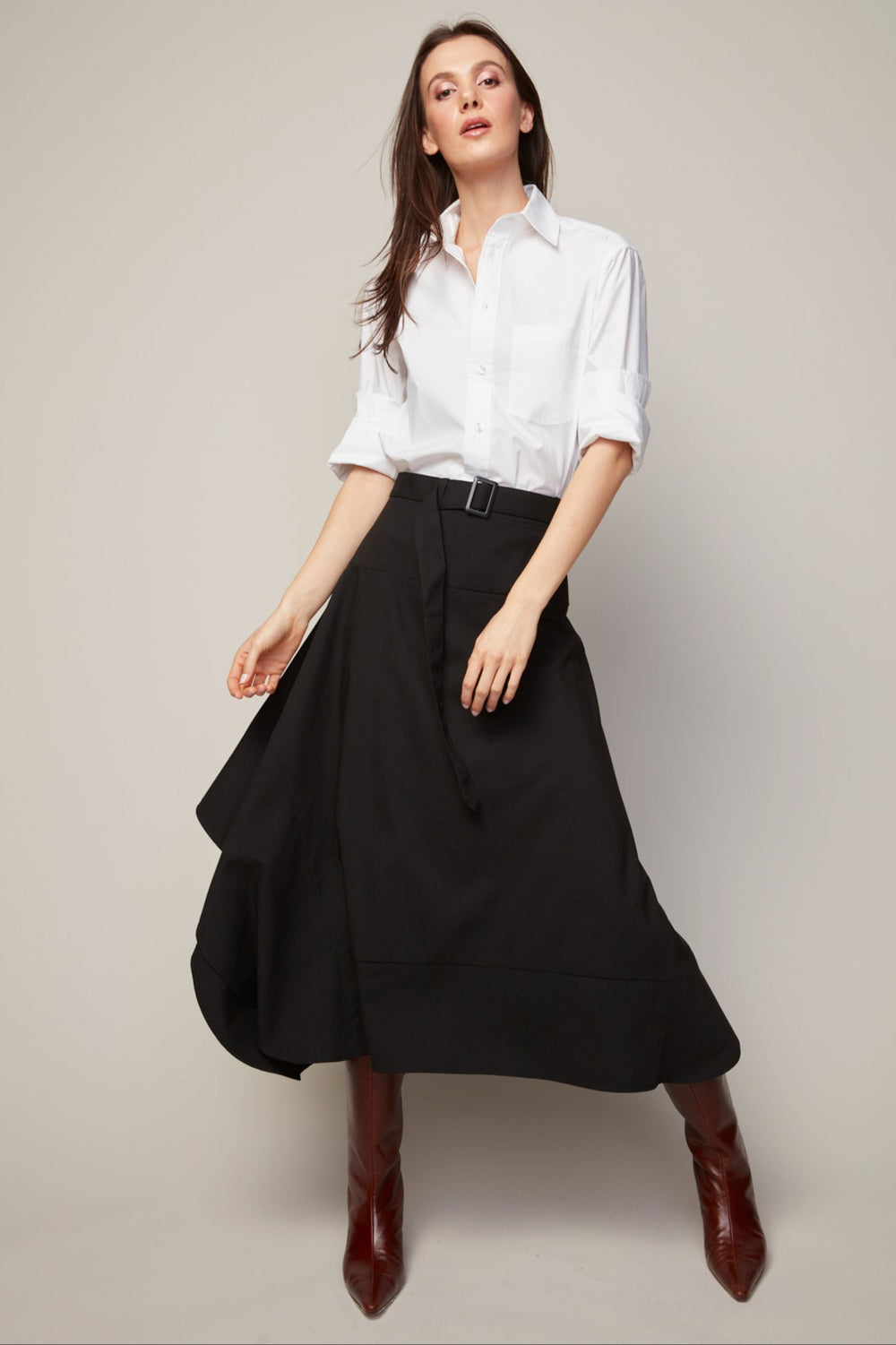 Adroit Atelier Benika Long Asymmetric Flair Skirt in Black available at Barbara Katz