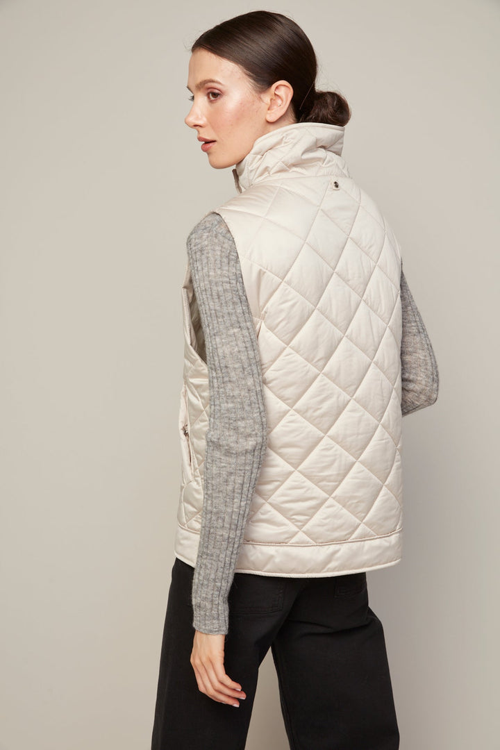Adroit Atelier Brielle Quilted Sleeveless Funnel Neck Vest in Birch available at Barbara Katz
