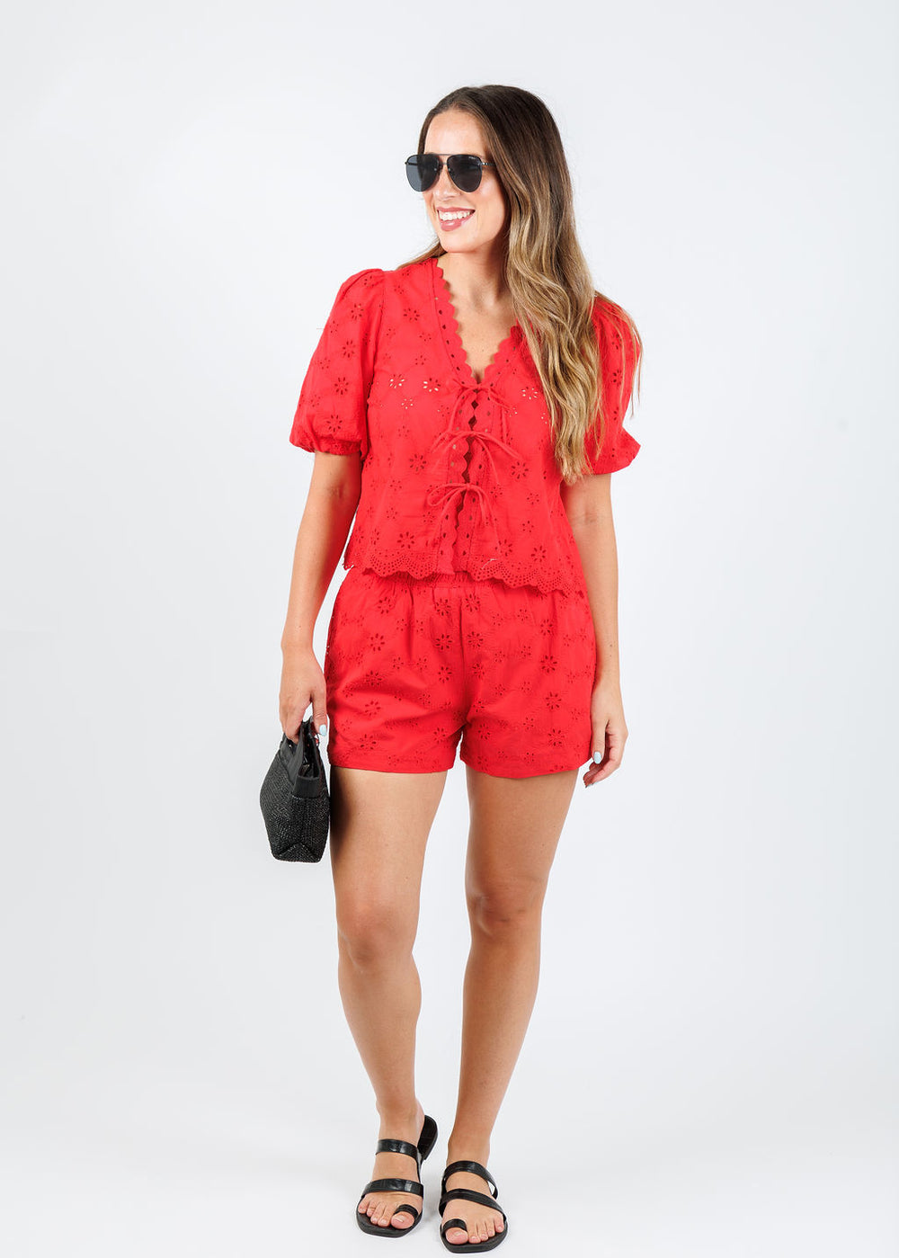 BK Yuiko Top in Poppy paired with matching Yuiko Shorts, Daniella Lehavi Ocean Clutch Bag in Black Straw available at Barbara Katz
