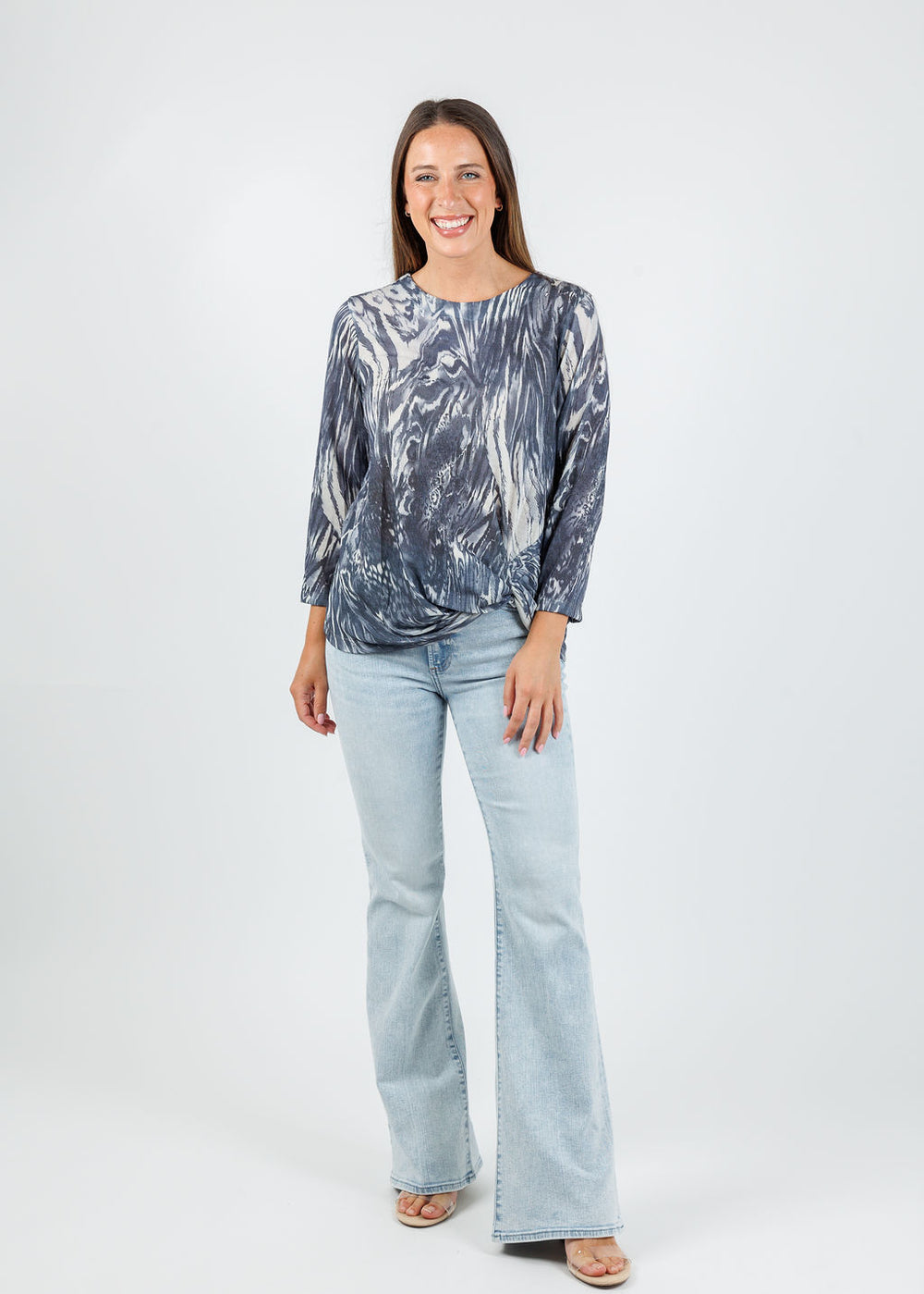 BK Lexi Twist Mixed Animal Top in Navy Fossil paired with Pistola Mid Rise Ultra Flare Jeans in Serenity available at Barbara Katz