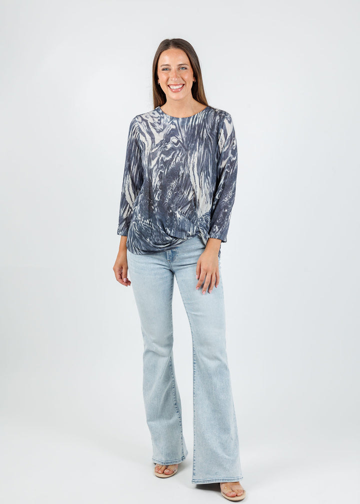 BK Lexi Twist Mixed Animal Top in Navy Fossil paired with Pistola Mid Rise Ultra Flare Jeans in Serenity available at Barbara Katz