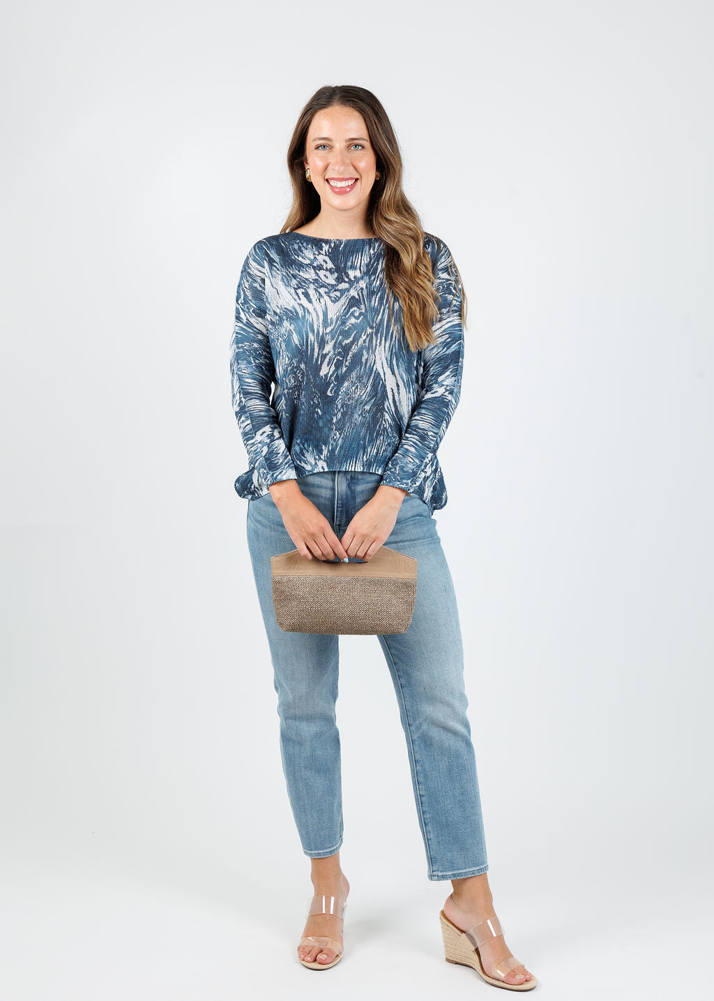 BK Lili Boat Neck Sweater in Navy Fossil paired with Pistola Monroe Crop Jeans in Hill, Daniella Lehavi Ocean Clutch in Mocca Straw available at Barbara Katz