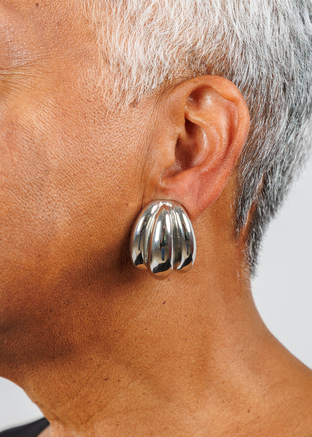 Ben Amun Ridged Clip-On Earrings in Silver available at Barbara Katz