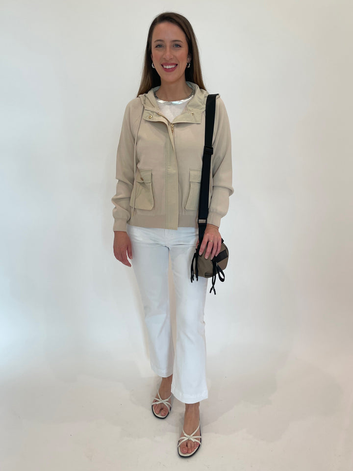 Elliott Lauren Living Proof Zip Front Jacket in Khaki paired with Elliott Lauren 5-Pocket Baby Boot Crop Jeans in White, Daniella Lehavi Bonnie Mini Crossbody Bag in Taupe available at Barbara Katz