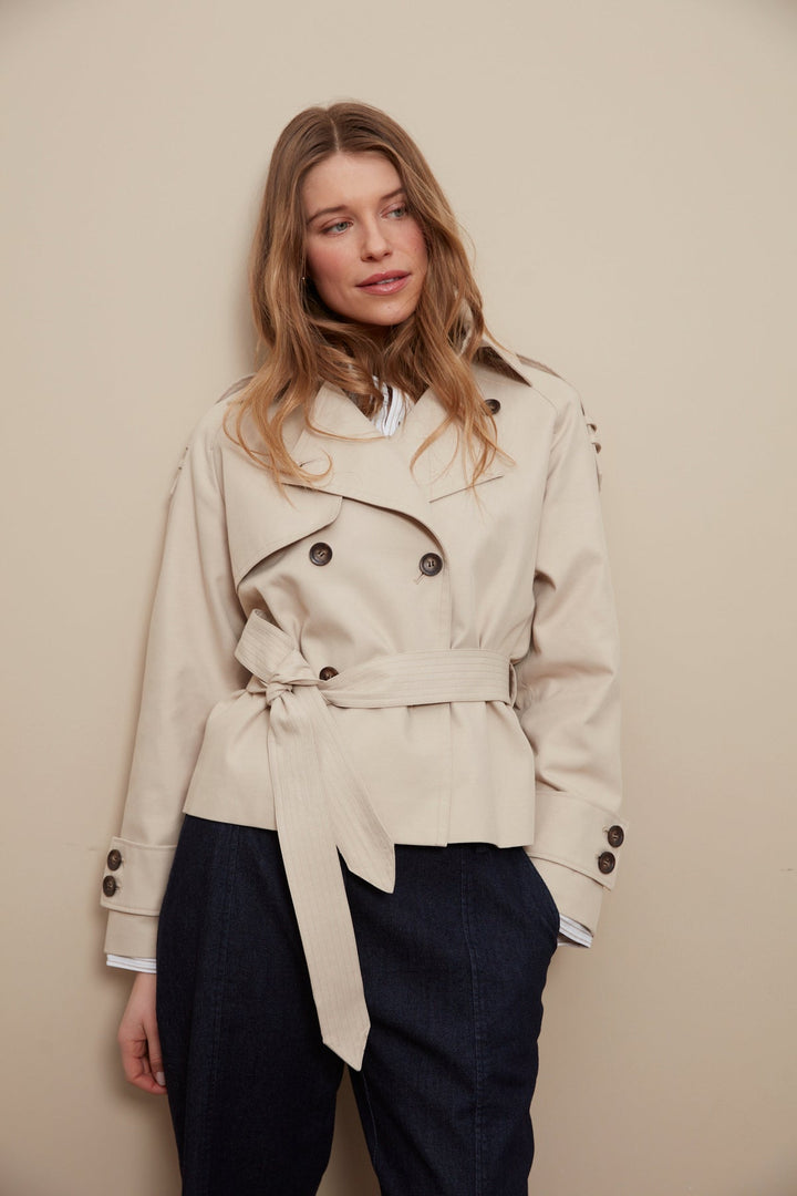 Adroit Atelier Calista Short Double Breasted Trench Coat in Sand available at Barbara Katz