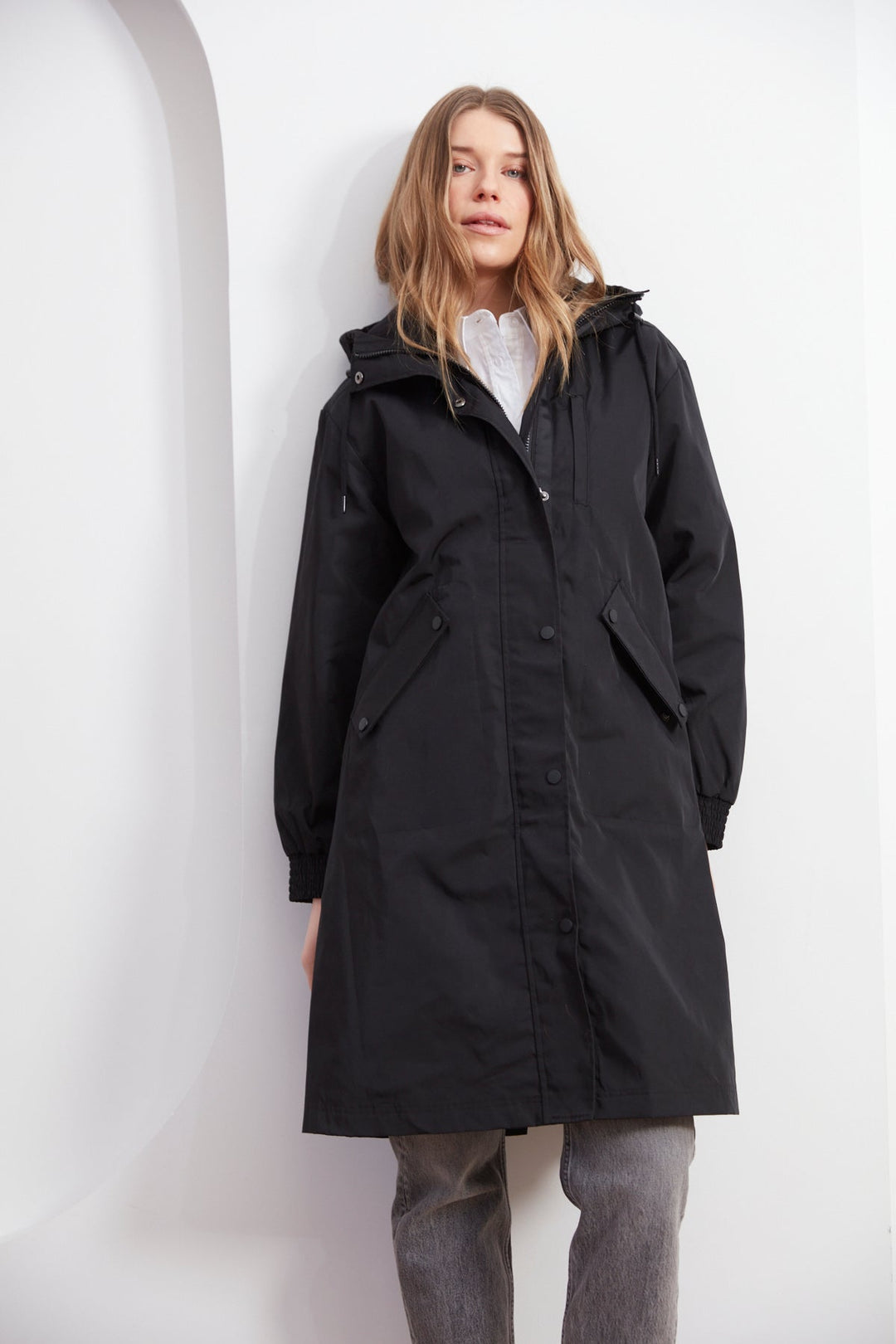 Adroit Atelier Chelsea The City Hooded Raincoat in Black available at Barbara Katz