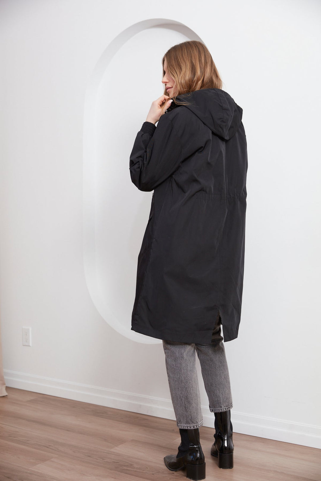 Adroit Atelier Chelsea The City Hooded Raincoat in Black available at Barbara Katz